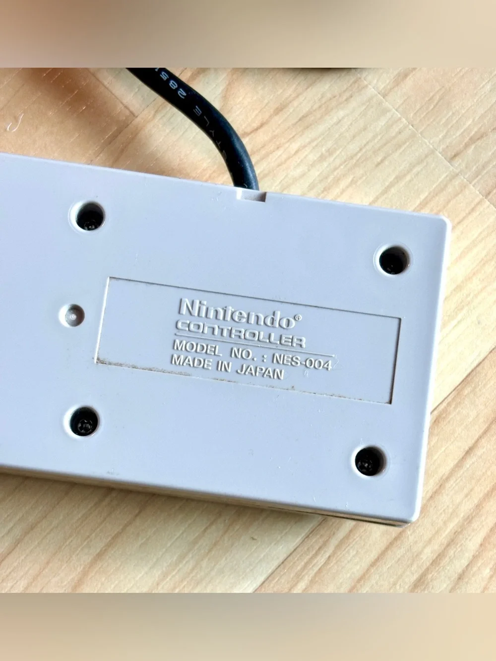 Nintendo Entertainment System (NES) controller, model NES-004. Set of two.